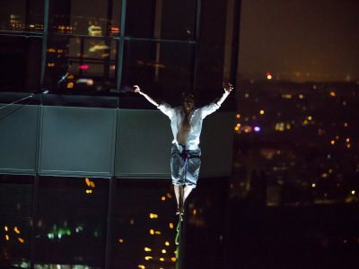 A tightrope walker, who walked at a height of 70 metres above the audience on the FILADELFIE building